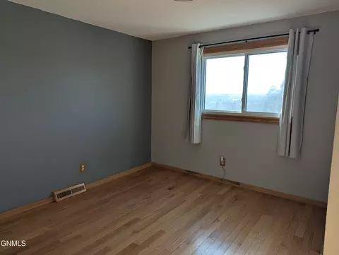 Bedroom - 709 Johns Dr, Mandan, ND 58554 photo 7 of 9