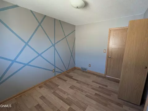 Bedroom - 709 Johns Dr, Mandan, ND 58554 photo 3 of 9
