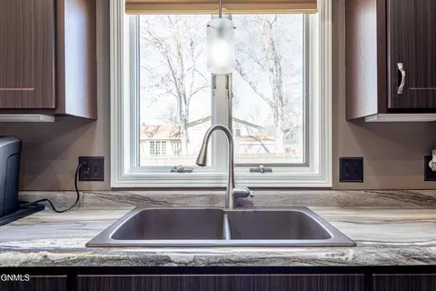 Kitchen - 302 Stuttgart Dr, Bismarck, ND 58504 photo 7 of 8