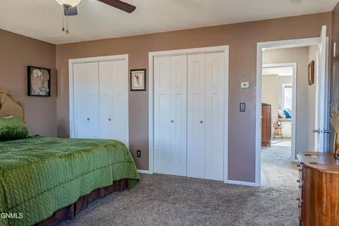 Bedroom - 302 Stuttgart Dr, Bismarck, ND 58504 photo 3 of 10
