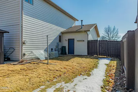 Exterior - 302 Stuttgart Dr, Bismarck, ND 58504 photo 9 of 16