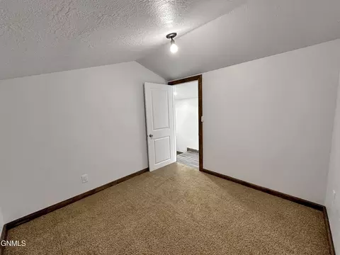 Bedroom - 5507 145th Ave NW, Williston, ND 58801 photo 13 of 15