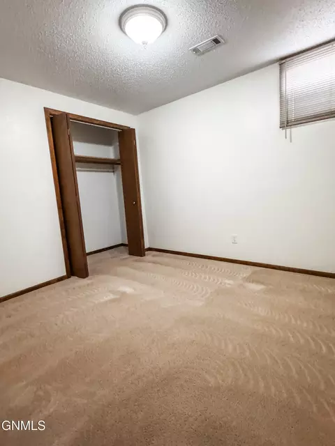Bedroom - 624 11th St E, Williston, ND 58801 photo 4 of 5