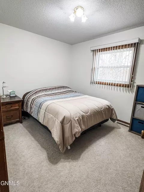 Bedroom - 624 11th St E, Williston, ND 58801 photo 2 of 5
