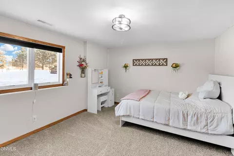 Bedroom - 7606 Moonlite Rd, Bismarck, ND 58503 photo 10 of 16