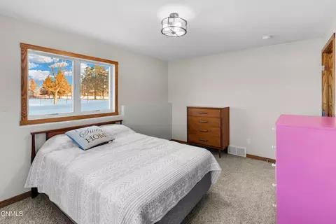 Bedroom - 7606 Moonlite Rd, Bismarck, ND 58503 photo 15 of 16