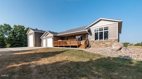 Exterior - 7606 Moonlite Rd, Bismarck, ND 58503 photo 4 of 8