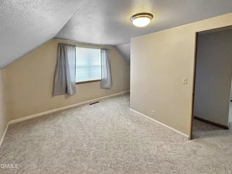 Bedroom - 1416 1st Ave E, Williston, ND 58801 photo 1 of 6