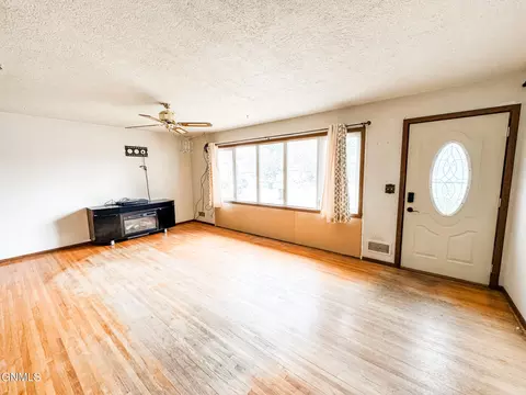 Living - 706 15th Ave W, Williston, ND 58801 photo 2 of 2