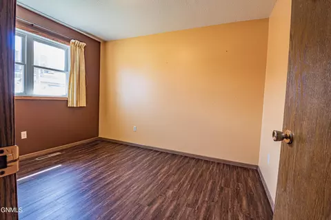 Bedroom - 543 7th St E, Dickinson, ND 58601 photo 5 of 8