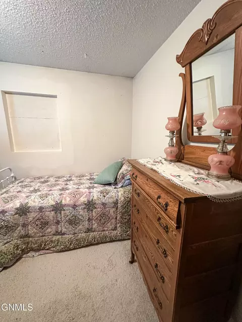 Bedroom - 206 2nd St NE, Steele, ND 58482 photo 8 of 13