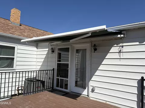Exterior - 824 4th Ave W, Williston, ND 58801 photo 6 of 7