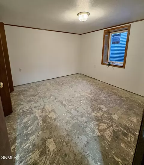 Bedroom - 824 4th Ave W, Williston, ND 58801 photo 6 of 7