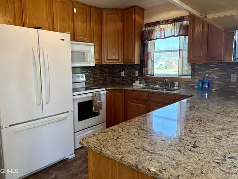 Kitchen - 824 4th Ave W, Williston, ND 58801 photo 2 of 4