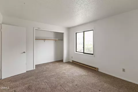 Bedroom - 504 26th St E, Williston, ND 58801 photo 2 of 3