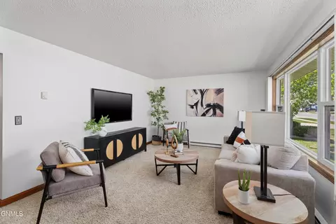 Living - 821 E Wachter Ave, Bismarck, ND 58504 photo 2 of 2