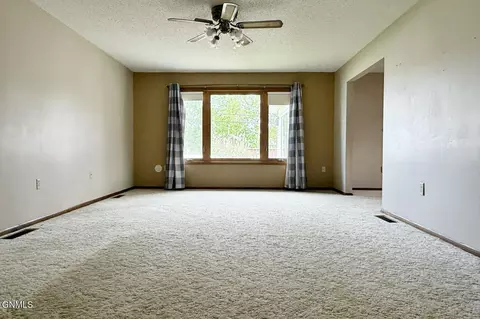Living - 618 11th St W, Williston, ND 58801 photo 1 of 4