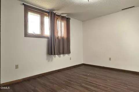 Bedroom - 618 11th St W, Williston, ND 58801 photo 4 of 5