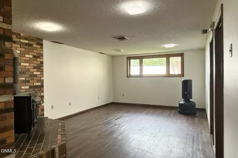 Living - 618 11th St W, Williston, ND 58801 photo 3 of 4