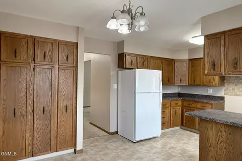 Kitchen - 618 11th St W, Williston, ND 58801 photo 5 of 9