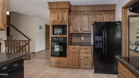 Kitchen - 201 E Brandon Dr, Bismarck, ND 58503 photo 3 of 3