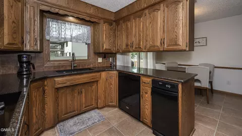Kitchen - 201 E Brandon Dr, Bismarck, ND 58503 photo 2 of 3