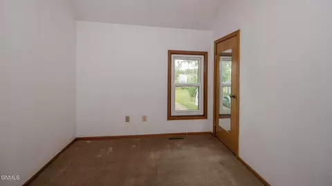 Bedroom - 16 Front Ave E, Menoken, ND 58558 photo 3 of 6