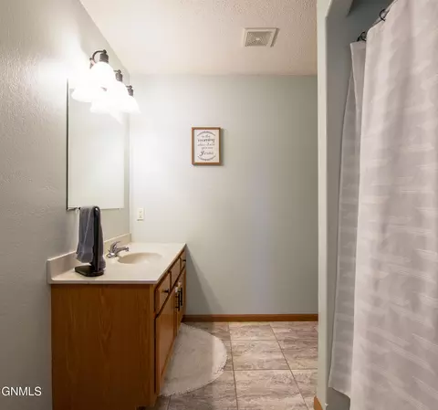 Bath - 128 Libby Rd, Lincoln, ND 58504 photo 1 of 2