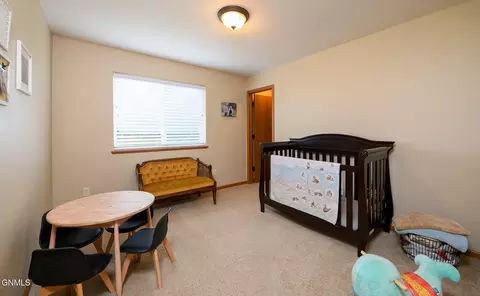 Bedroom - 128 Libby Rd, Lincoln, ND 58504 photo 2 of 4