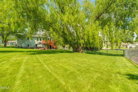 Exterior - 219 E Calgary Ave, Bismarck, ND 58503 photo 6 of 18