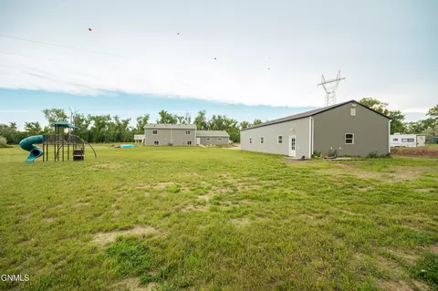 Exterior - 5706 Olive Tree Dr, Bismarck, ND 58503 photo 13 of 17