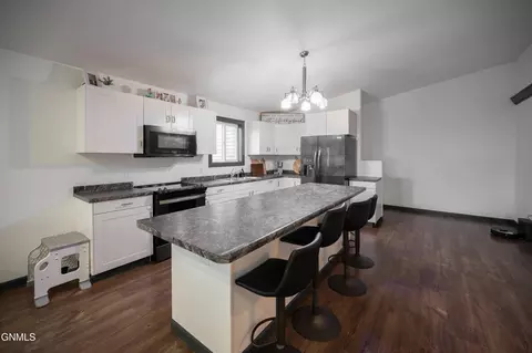 Kitchen - 5706 Olive Tree Dr, Bismarck, ND 58503 photo 2 of 7