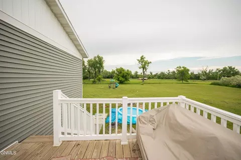 Exterior - 5706 Olive Tree Dr, Bismarck, ND 58503 photo 7 of 17