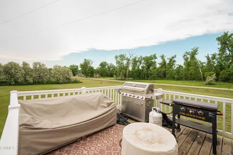 Exterior - 5706 Olive Tree Dr, Bismarck, ND 58503 photo 5 of 17