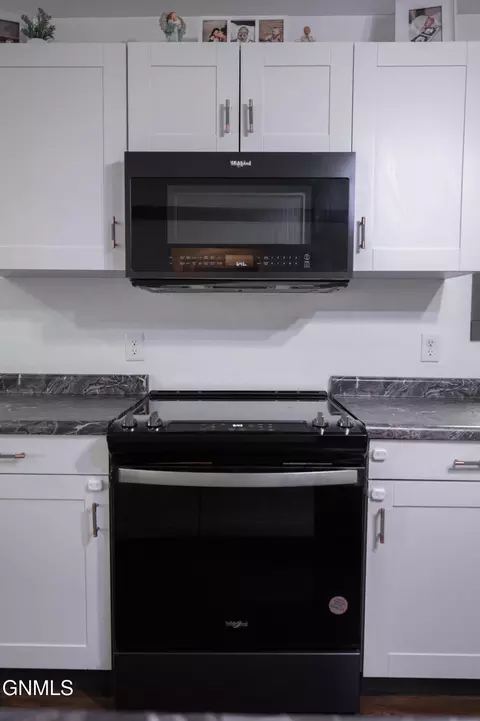 Kitchen - 5706 Olive Tree Dr, Bismarck, ND 58503 photo 4 of 7