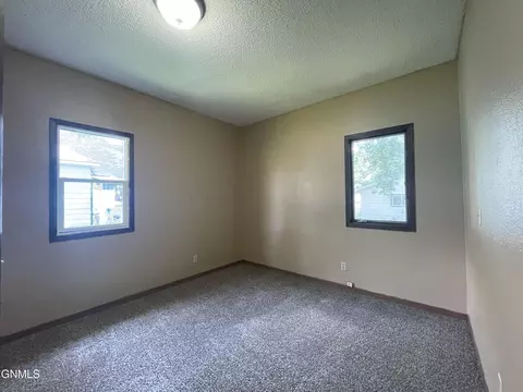 Bedroom - 913 Cedar Ave, Harvey, ND 58341 photo 1 of 2