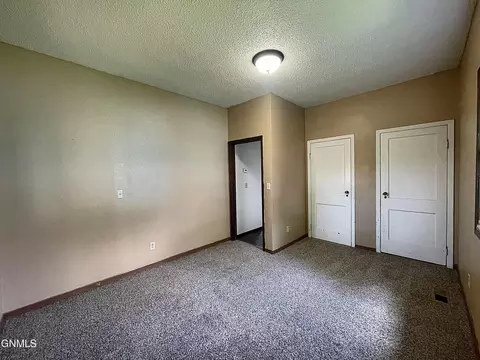 Bedroom - 913 Cedar Ave, Harvey, ND 58341 photo 2 of 2
