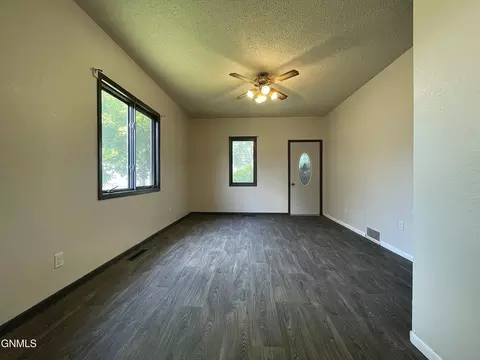 Living - 913 Cedar Ave, Harvey, ND 58341 photo 2 of 2