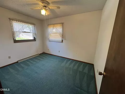Bedroom - 464 9th St E, Dickinson, ND 58601 photo 5 of 8