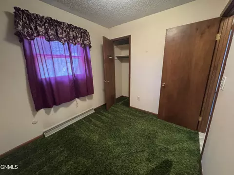 Bedroom - 464 9th St E, Dickinson, ND 58601 photo 1 of 8