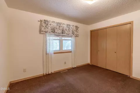 Bedroom - 41 Custer Dr, Lincoln, ND 58504 photo 2 of 8