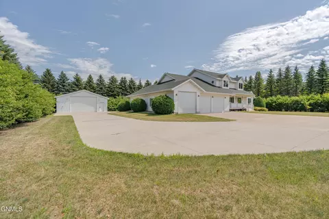 Exterior - 9601 Oak Dr, Bismarck, ND 58503 photo 9 of 30