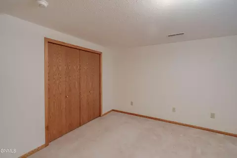 Bedroom - 9601 Oak Dr, Bismarck, ND 58503 photo 14 of 14