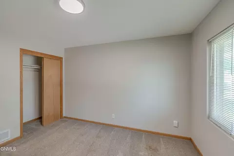 Bedroom - 1504 14th St N, Bismarck, ND 58501 photo 2 of 8