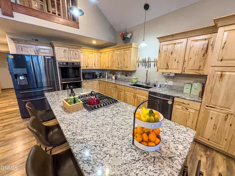 Kitchen - 12932 Clark Ct, Williston, ND 58801 photo 4 of 5