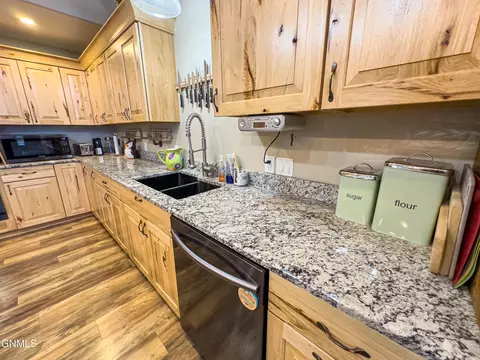 Kitchen - 12932 Clark Ct, Williston, ND 58801 photo 5 of 5