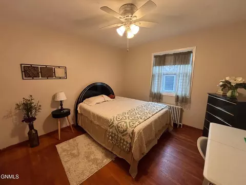 Bedroom - 402 Brewster St E, Harvey, ND 58341 photo 4 of 5