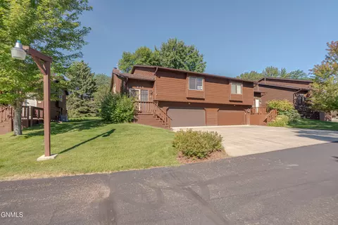 Exterior - 415 Brandon Dr, Bismarck, ND 58503 photo 3 of 12