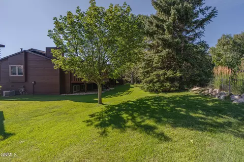 Exterior - 415 Brandon Dr, Bismarck, ND 58503 photo 8 of 12