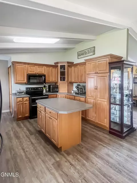 Kitchen - 703 14th St W, Williston, ND 58801 photo 1 of 3
